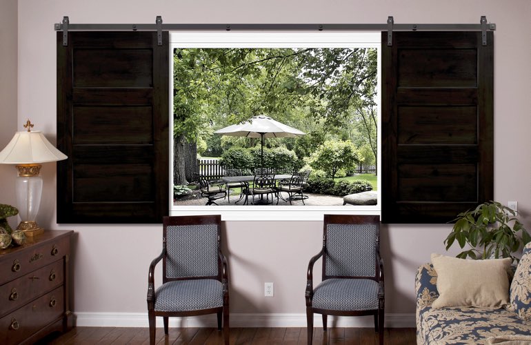 3 panel barn door shutters in living room